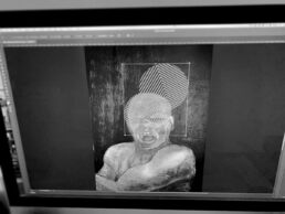 A portrait being worked on digitally on a computer screen